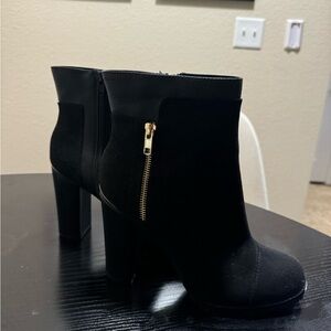 Brand new, never worn Juicy Couture booties